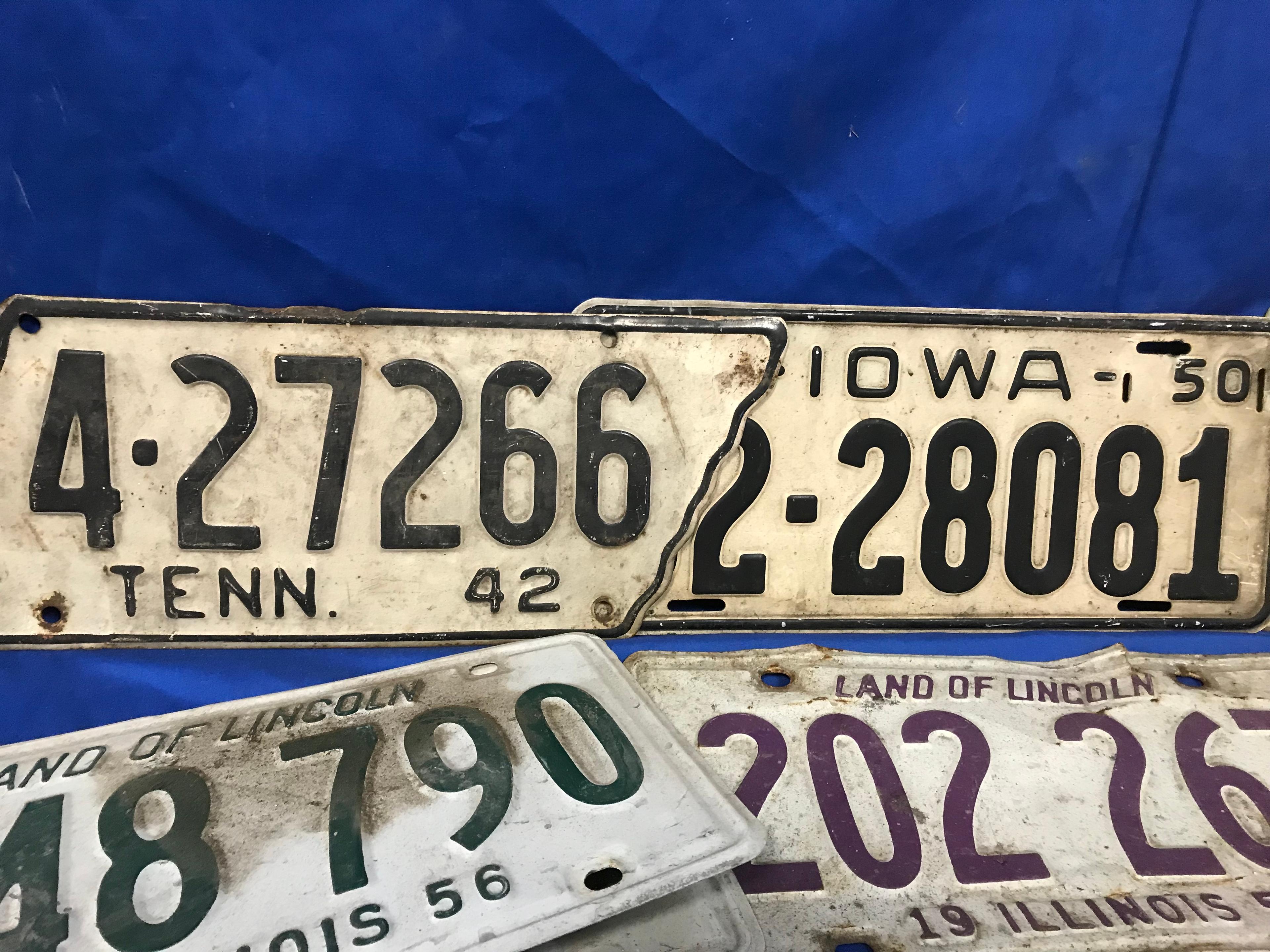 STACK OF (11) VARIOUS LICENSE PLATES 1942-1980