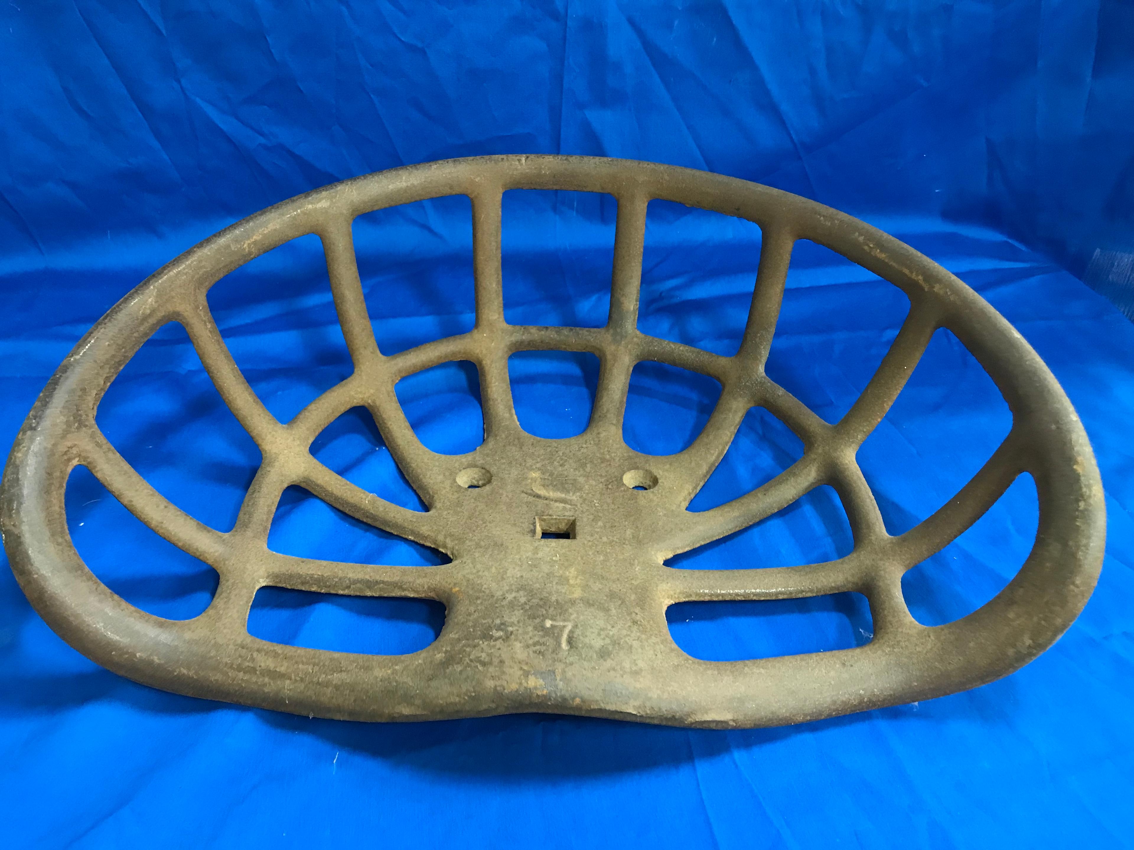 UNKNOWN CAST IRON IMPLEMENT / TRACTOR SEAT