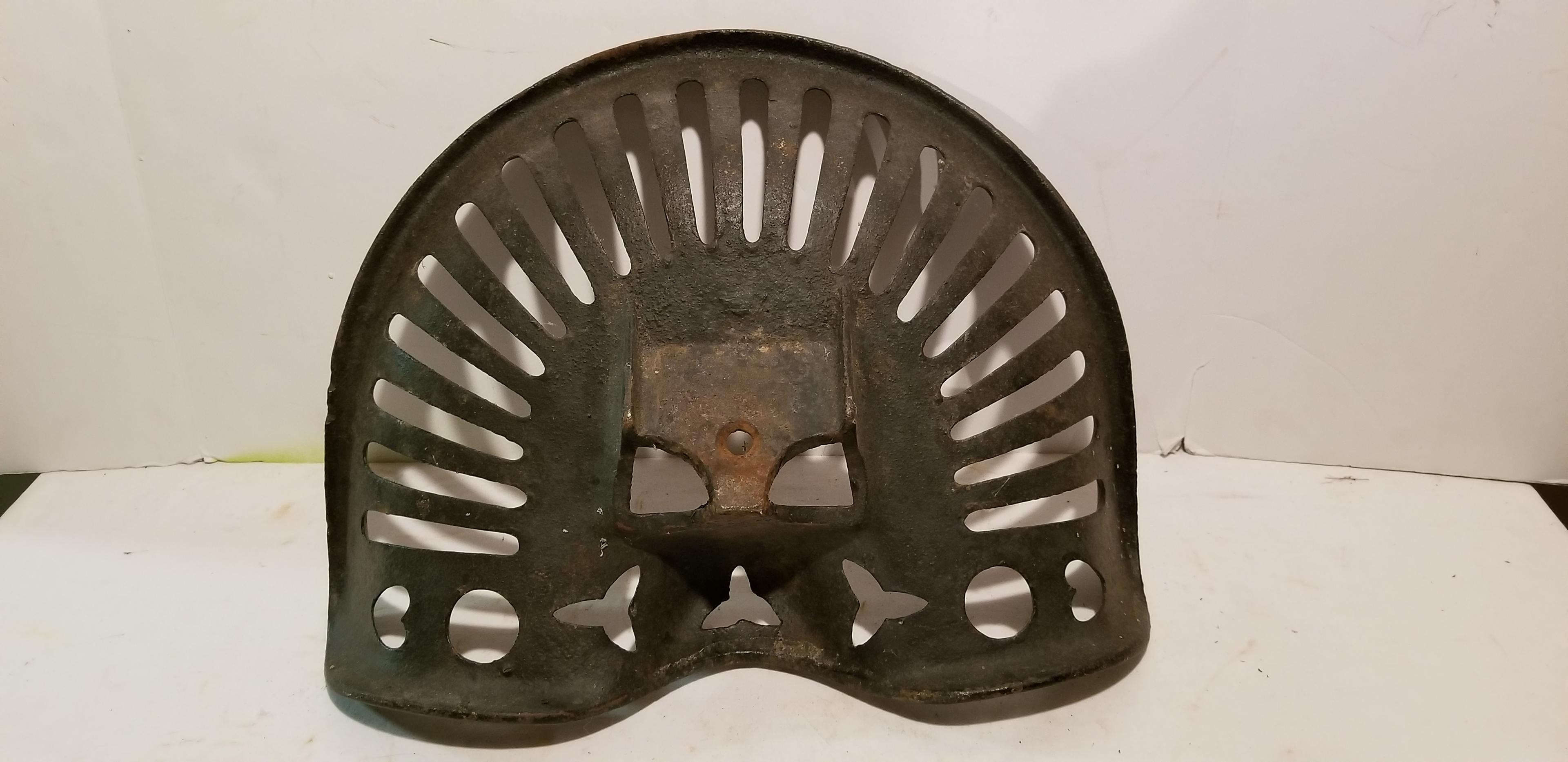 UNMARKED CAST IRON IMPLEMENT SEAT
