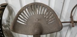 UNMARKED STEEL IMPLEMENT OR TRACTOR SEAT