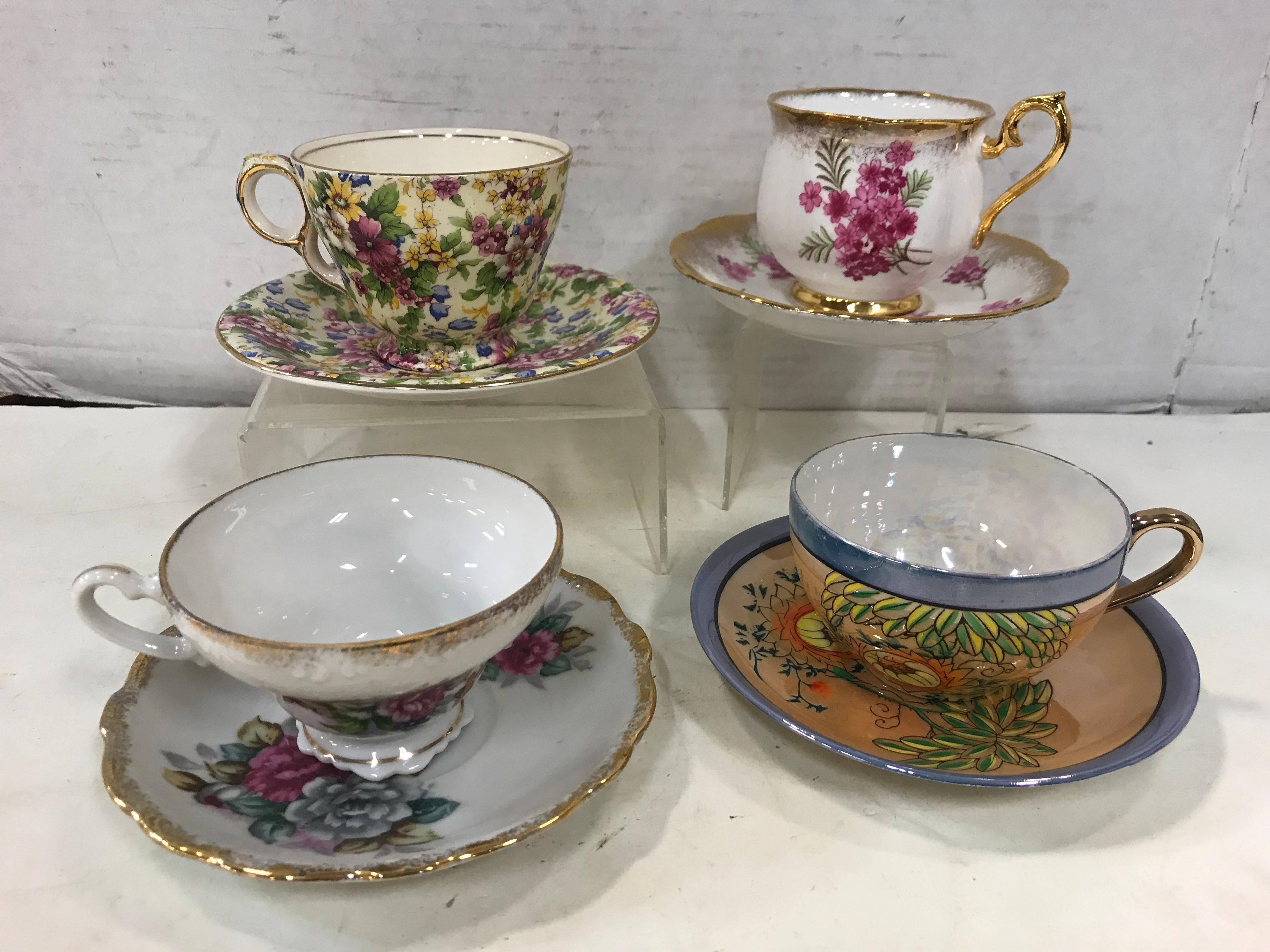 (4) ASSORTED COLLECTOR CUP & SAUCERS