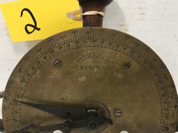 UNUSUAL BRASS SCALE