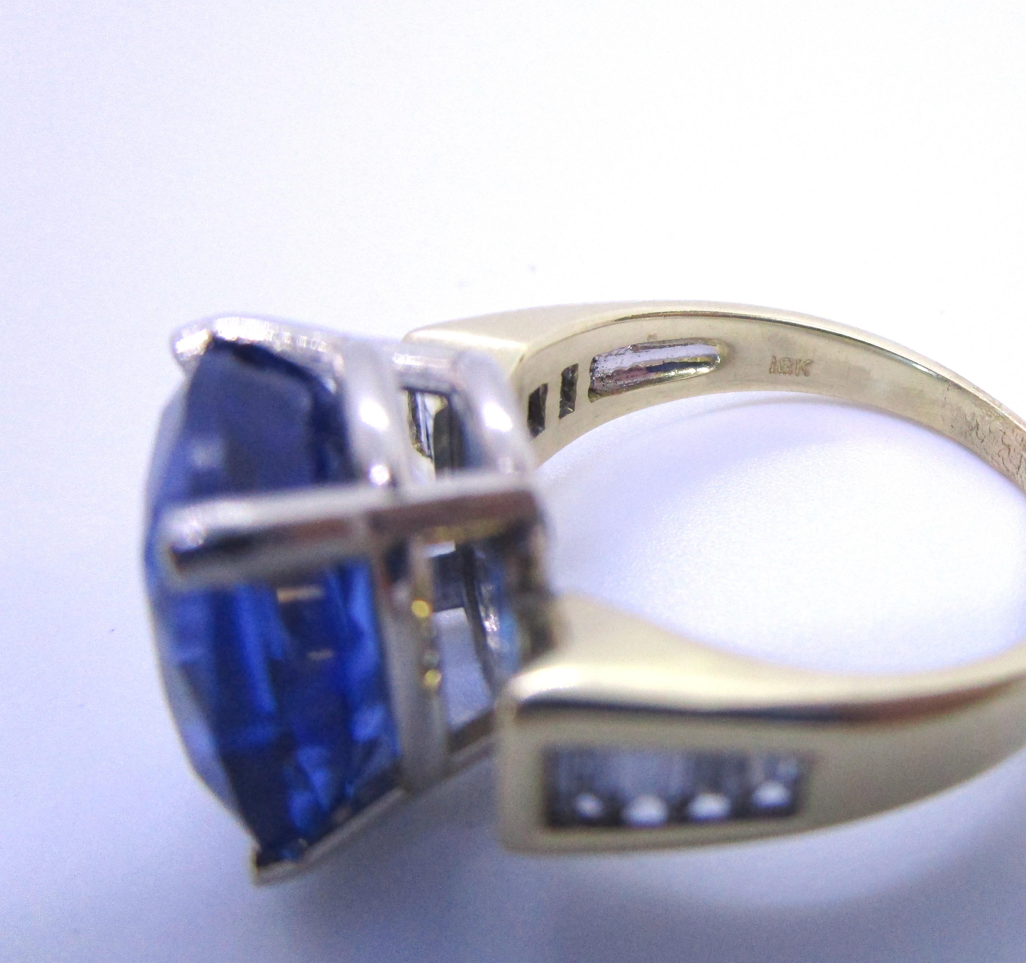 5.70 CARAT TANZANITE .65CT DIAMOND RING 18K GOLD