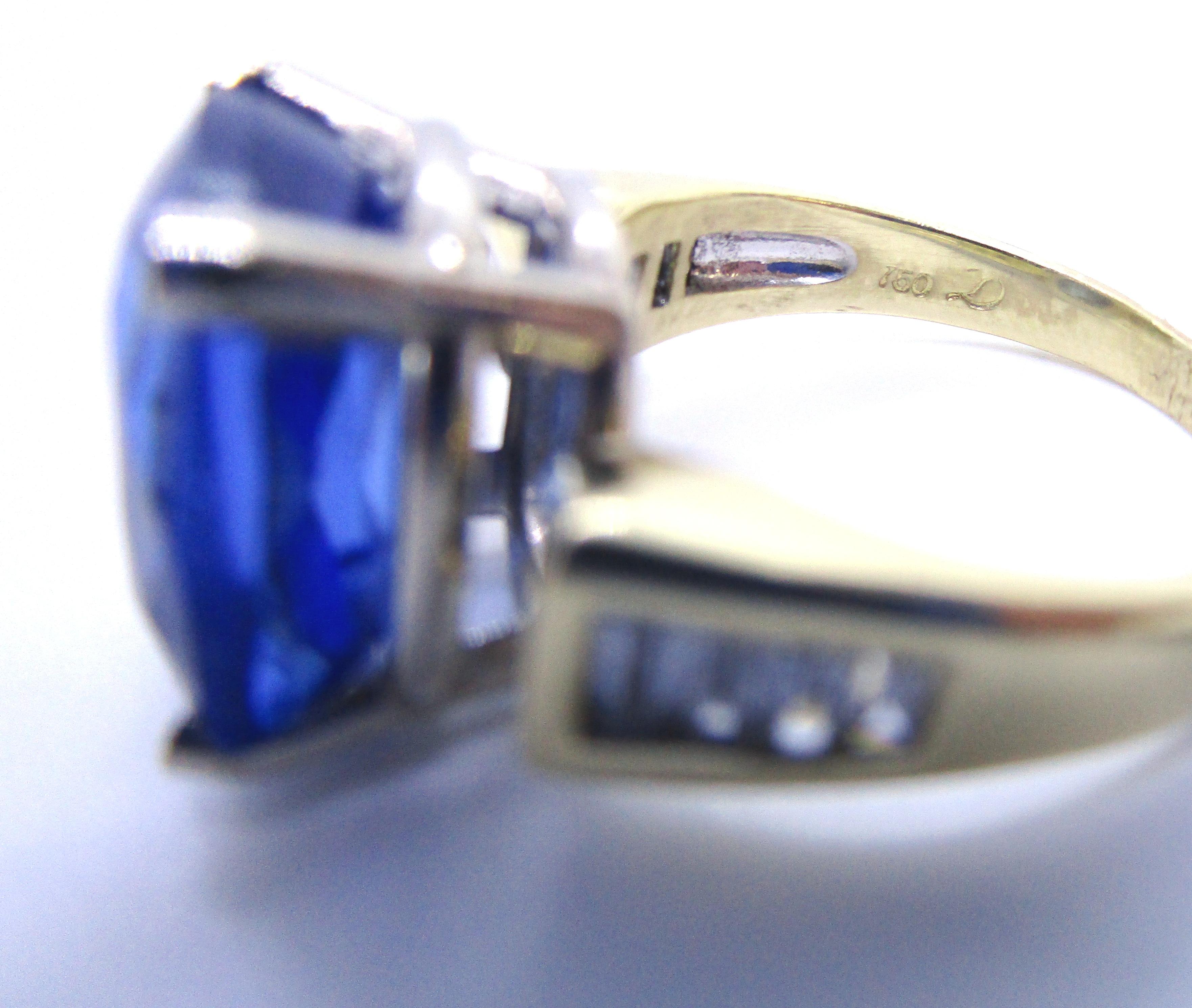 5.70 CARAT TANZANITE .65CT DIAMOND RING 18K GOLD