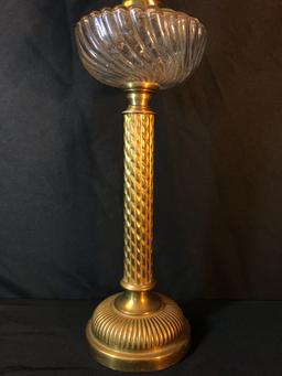 Antique Oil Lamp With Clear Font In A Swirl Pattern & Ornate Brass Base & Stem