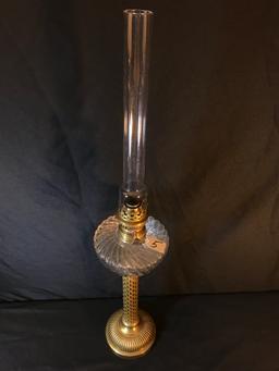 Antique Oil Lamp With Clear Font In A Swirl Pattern & Ornate Brass Base & Stem