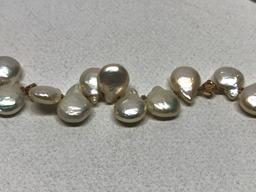 Seed Pearl Necklace In Silk Pouch is 20" long. *Clasp has some damage-most likely needs restr