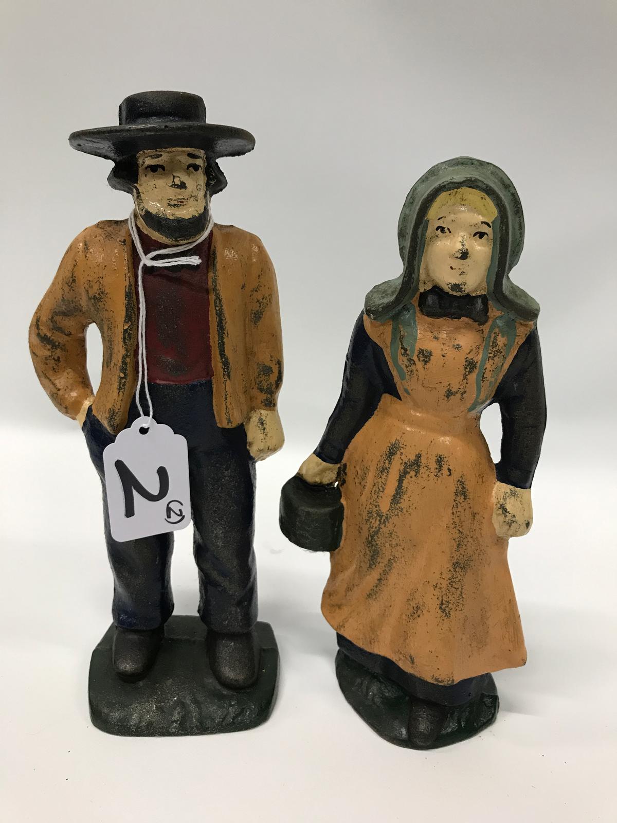 Older Cast Iron Amish Man & Woman Door Stops