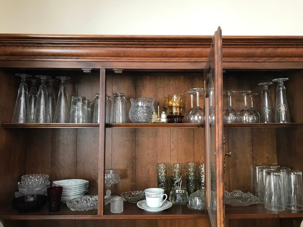 Large Selection of Glassware in China Cabinet