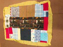 Vintage Wacky Free Form Patchwork Quilt With A Satin Edging.