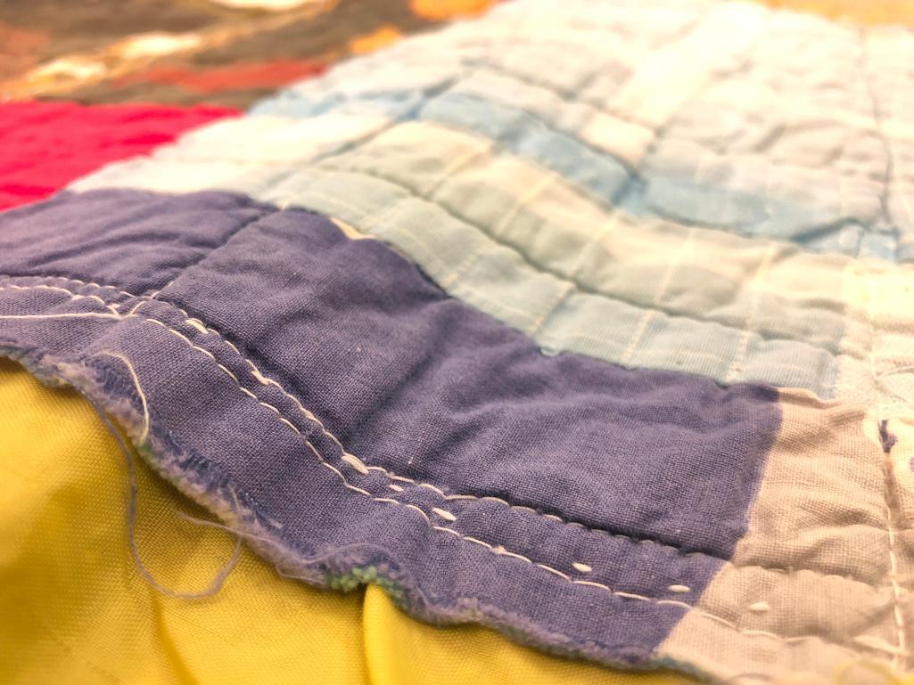 Vintage Wacky Free Form Patchwork Quilt With A Satin Edging.