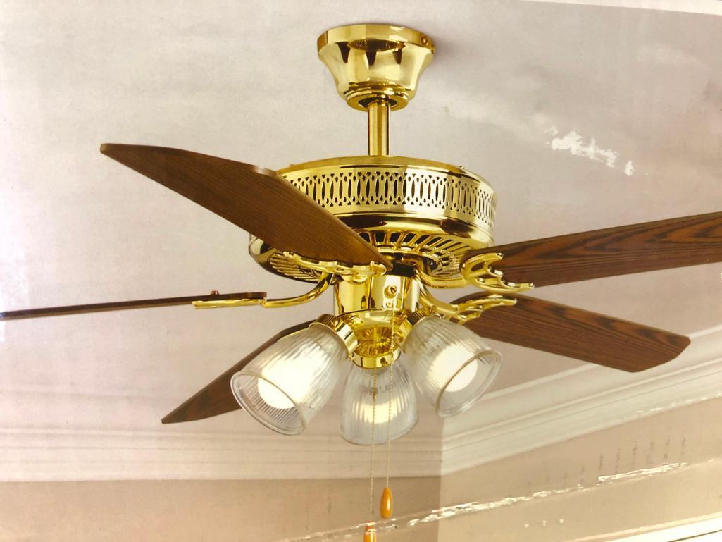 52 inch Hampton Bay Landmark Plus Ceiling Fan. Polished Brass Finish. Clear Ribbed Glass Shades.