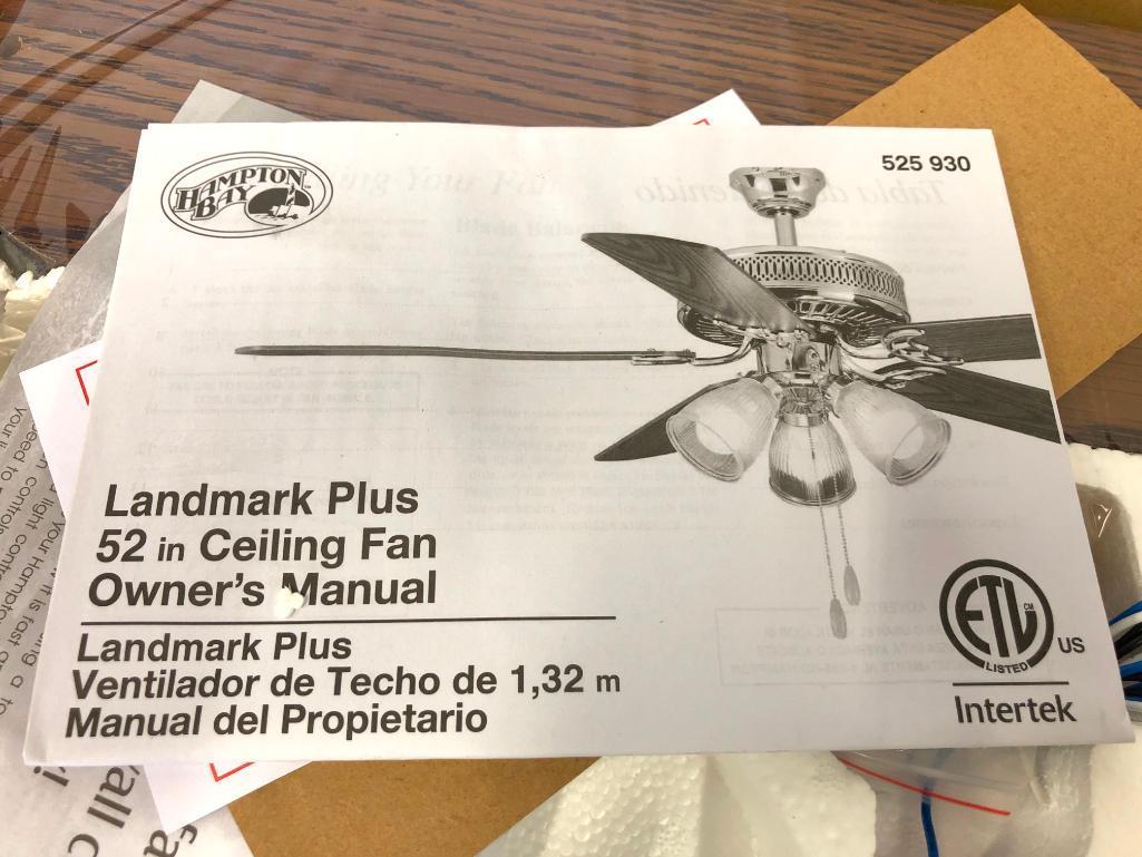 52 inch Hampton Bay Landmark Plus Ceiling Fan. Polished Brass Finish. Clear Ribbed Glass Shades.