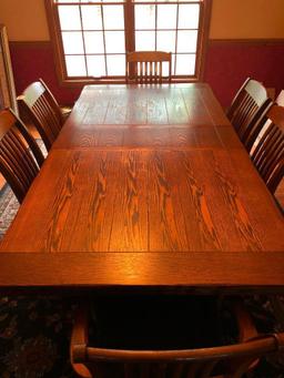 Oak Trestle Type Dining Room Table W/(6) Chairs & (1) Leaf