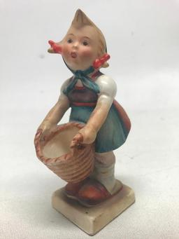 M. I. Hummel Figurine: "Girl With Basket"