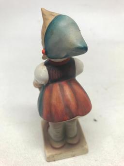 M. I. Hummel Figurine: "Girl With Basket"