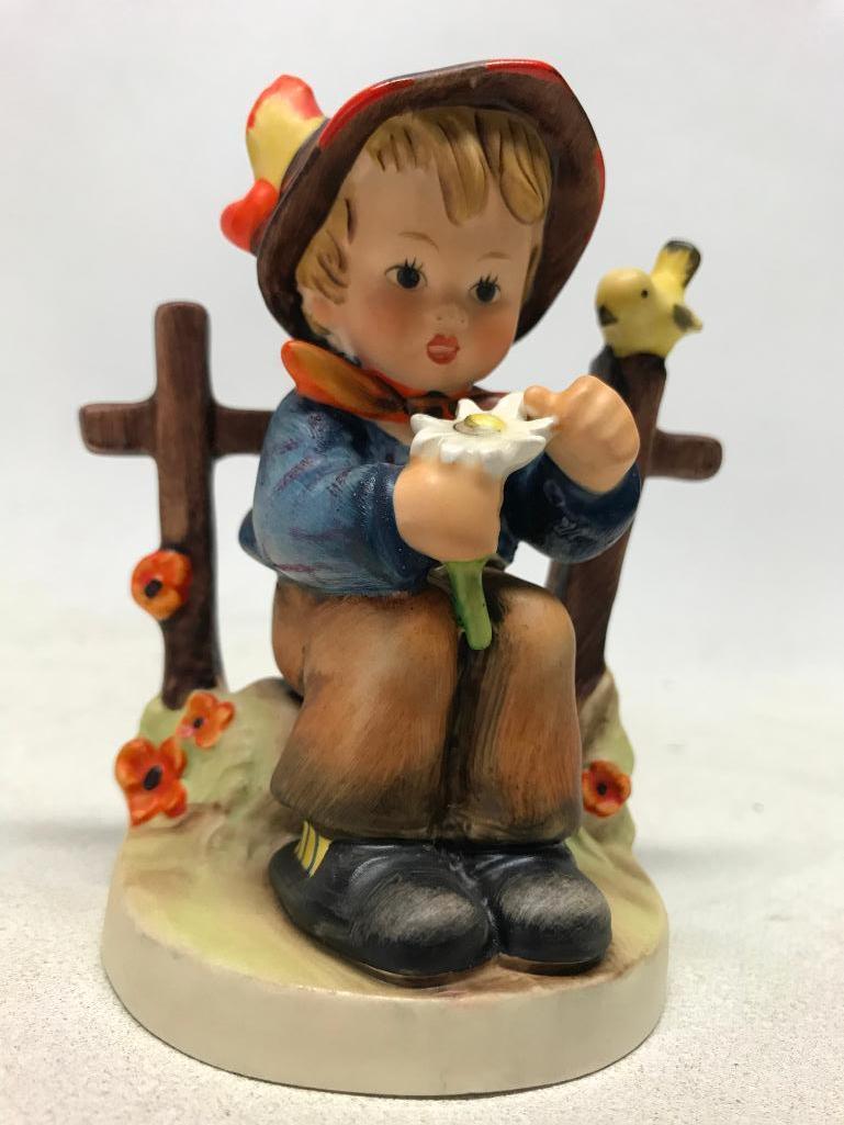 Hummel Figurine: Boy Picking Daisies By Fence