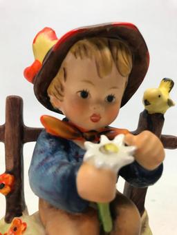 Hummel Figurine: Boy Picking Daisies By Fence