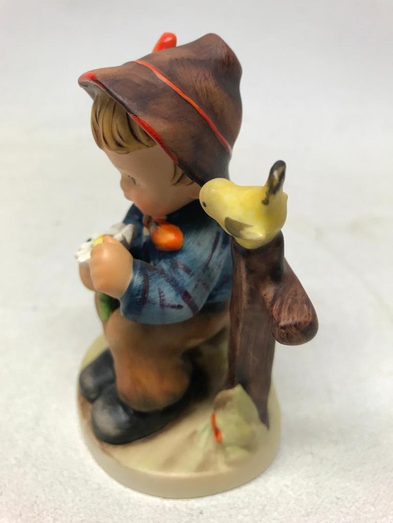 Hummel Figurine: Boy Picking Daisies By Fence
