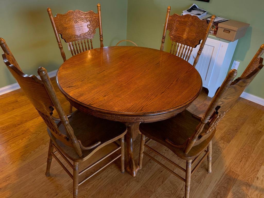 Round Oak Table W/(4) Matching Press-Back Spindle Chairs