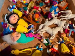 Group of Disney Snow White Toys and Some White Horses