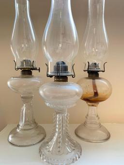Three Antique Oil Lamps with Glass Chimneys