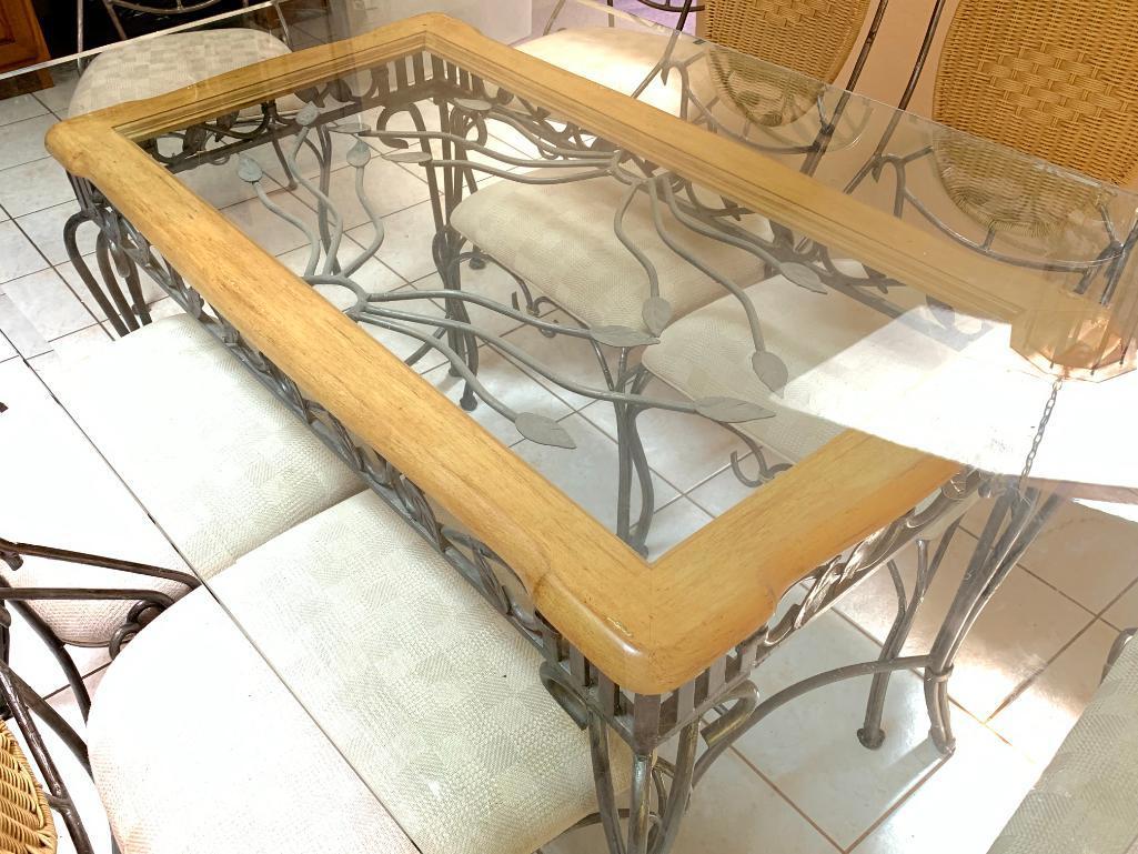Glass top and Wrought Iron Table and 8 Chairs