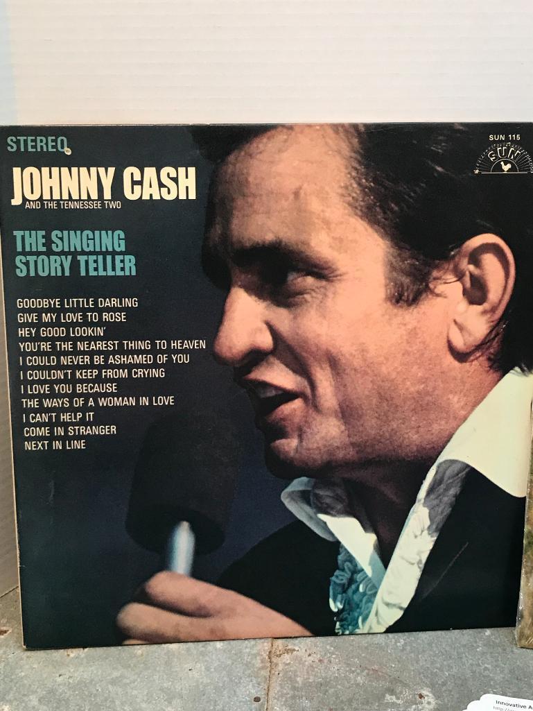 Two Johnny Cash 33 RPM Records as Pictured