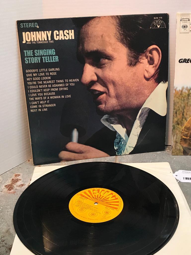 Two Johnny Cash 33 RPM Records as Pictured