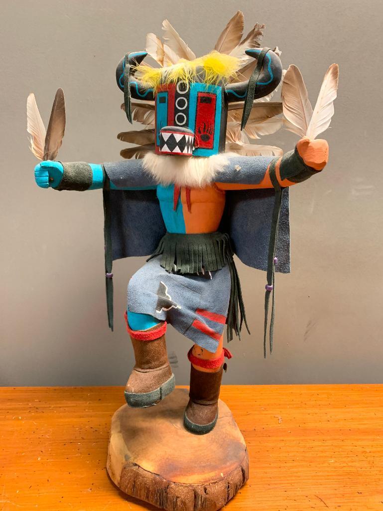 This is what appears to be a Road Runner Kachina Doll, Hand Crafted from Wood and Stands 23" Tall