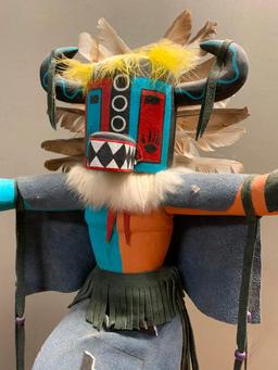 This is what appears to be a Road Runner Kachina Doll, Hand Crafted from Wood and Stands 23" Tall