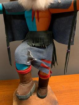 This is what appears to be a Road Runner Kachina Doll, Hand Crafted from Wood and Stands 23" Tall
