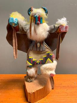 This is what appears to be a Road Runner Kachina Doll, Hand Crafted from Wood and Stands 14" Tall,