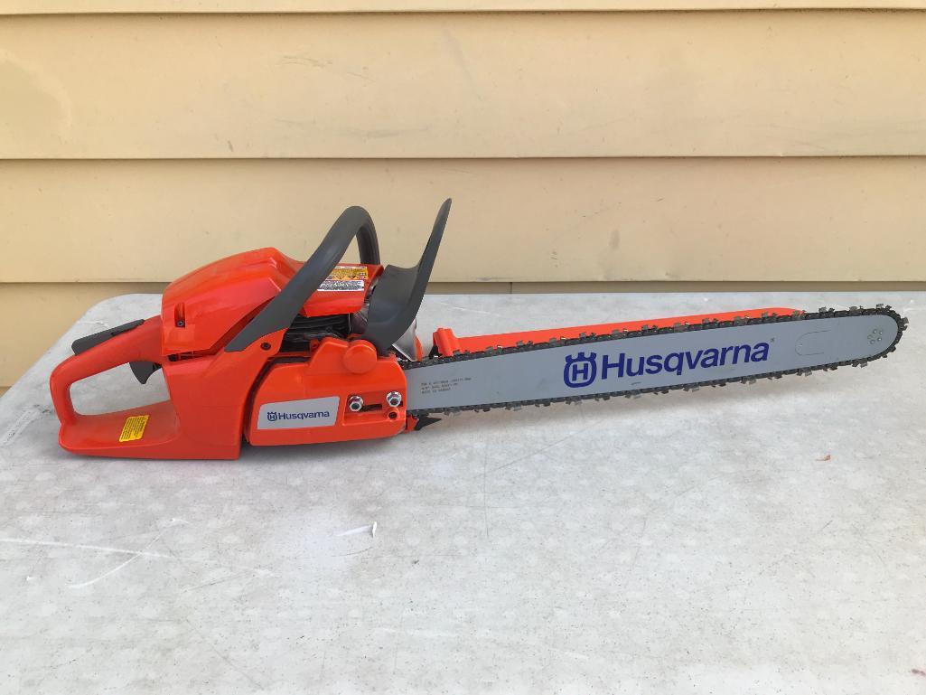 Husqvarna Chainsaw with 24" Blade. This Item is has Little or No Use