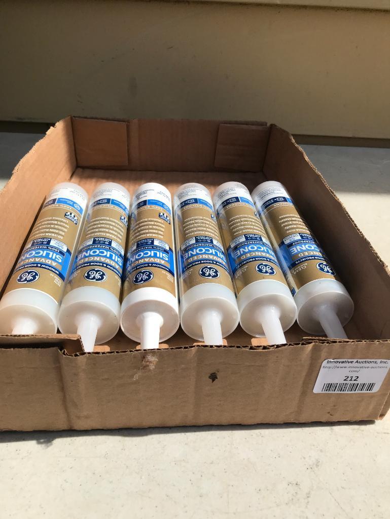 6 Piece Lot of GE Door/Window Silicone. These Items are Unused - As Pictured