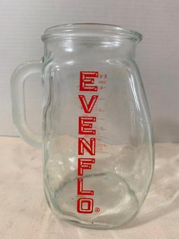 Evenflo Water Pitcher. Has Chips around the Top Lid. This Item is 7" Tall - As Pictured