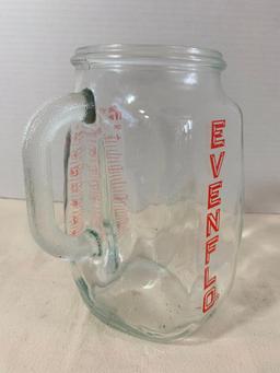 Evenflo Water Pitcher. Has Chips around the Top Lid. This Item is 7" Tall - As Pictured
