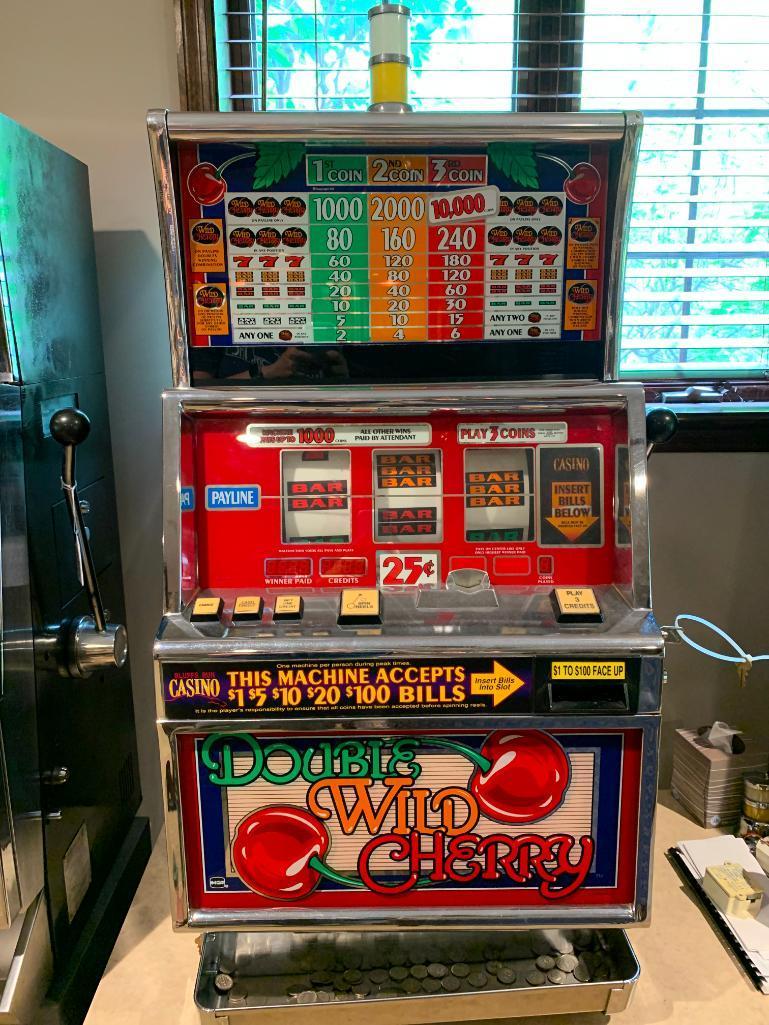 Double Wild Cherry Slot Machine w/Keys. This is 42" Tall x 24" Wide x 20" Deep. - As Pictured