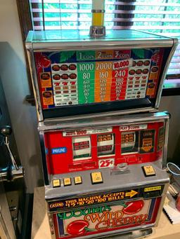 Double Wild Cherry Slot Machine w/Keys. This is 42" Tall x 24" Wide x 20" Deep. - As Pictured
