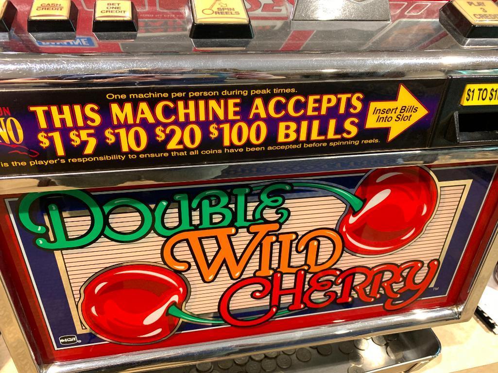 Double Wild Cherry Slot Machine w/Keys. This is 42" Tall x 24" Wide x 20" Deep. - As Pictured