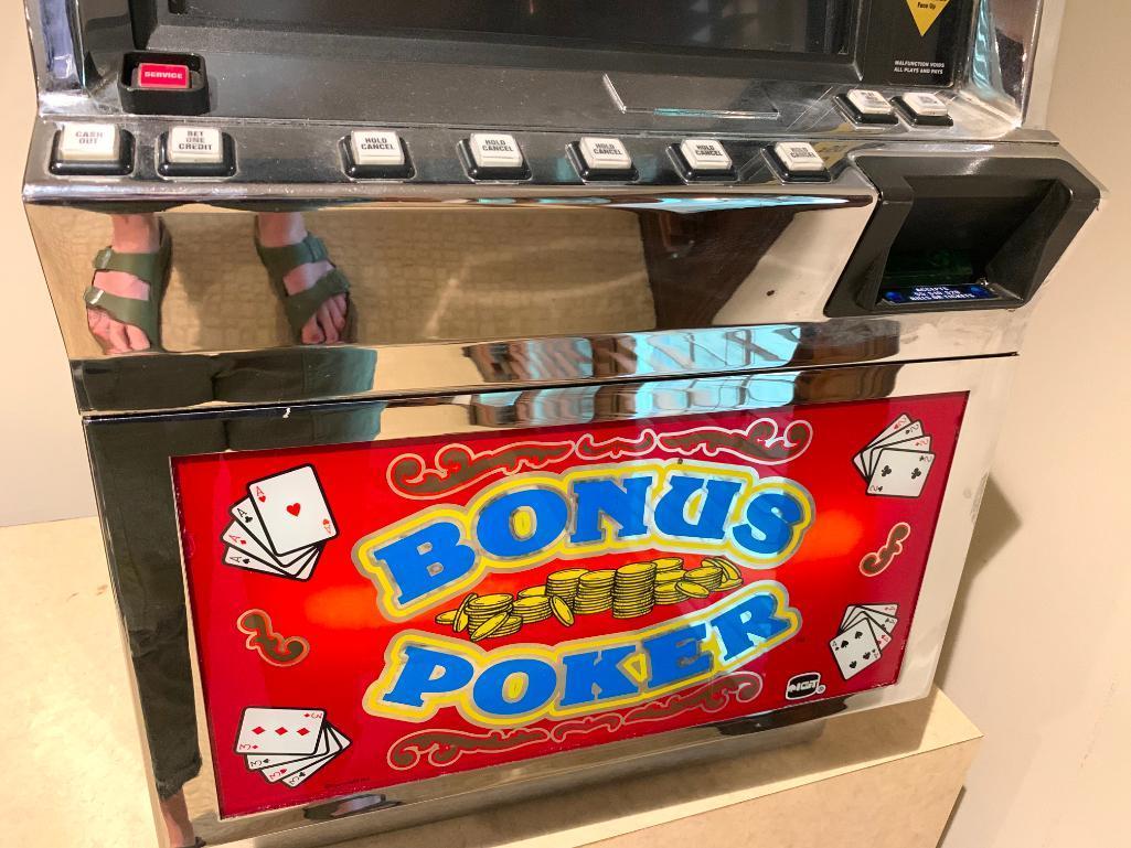 Bonus Poker Slot Machine w/Keys. This is 42" Tall x 24" Wide x 20" Deep - As Pictured