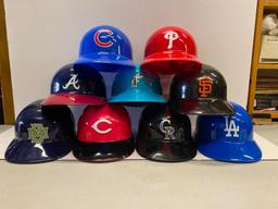 9 National League Baseball Helmets. They are 5.5" Tall - As Pictured