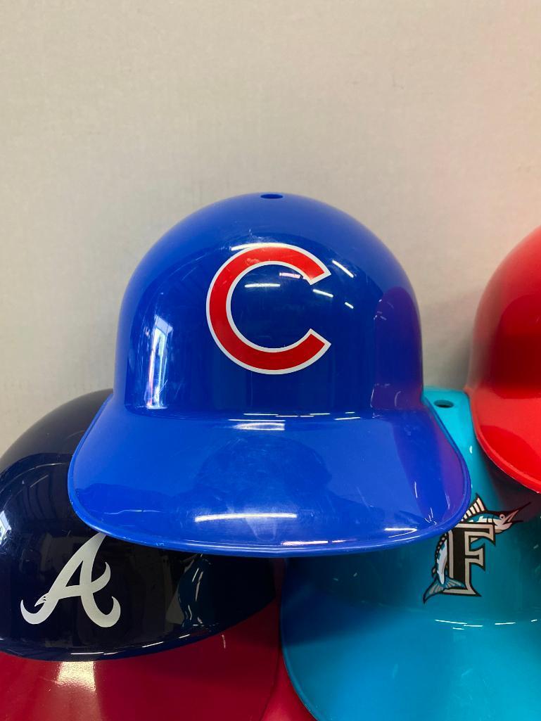 9 National League Baseball Helmets. They are 5.5" Tall - As Pictured