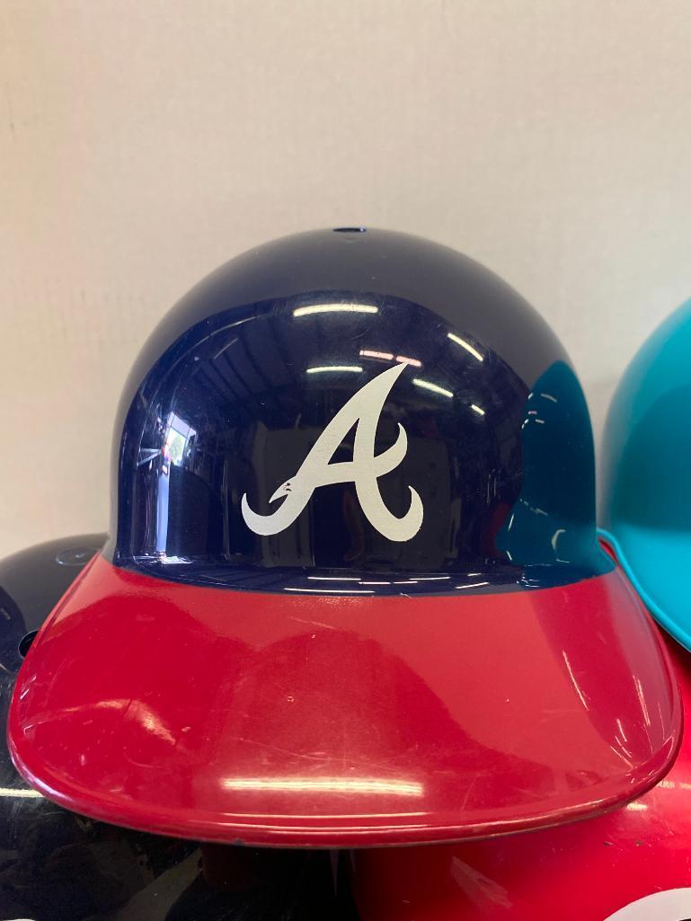 9 National League Baseball Helmets. They are 5.5" Tall - As Pictured