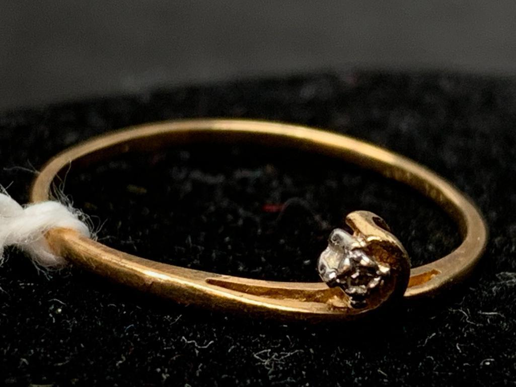 10 KT Gold Diamond Ring. The Weight is .7 Grams - As Pictured