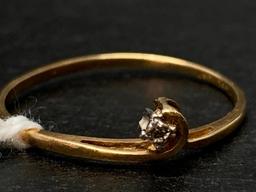 10 KT Gold Diamond Ring. The Weight is .7 Grams - As Pictured