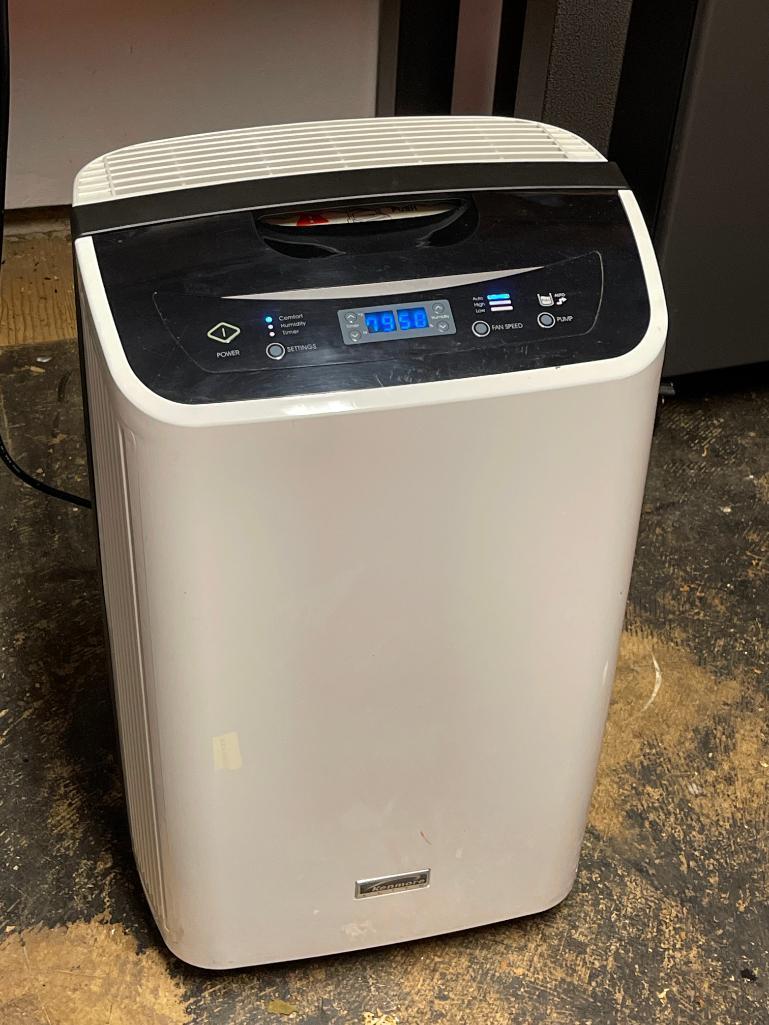 Kenmore Dehumidifier. This is 25" T x 15" W x 12" D & is in Working Condition - As Pictured