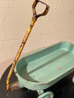 Antique Little toy Blue Metal Wagon. Has Rust Condition Issues. This is 6.5" x 15" - As Pictured