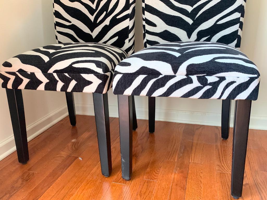 Pair of Zebra Print Accent Chairs. They are 39" T x 17" W - As Pictured