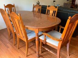 Dining Room Table & 6 Chairs (2 Captain). the Table is 29" T x 69" W x 37" D (Without Leaf)